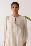 Buy_Nikasha_Cream Cotton Fabric Flowers Round Neck Jamdani Embroidered Yoke Tier Dress _Online_at_Aza_Fashions