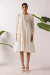 Buy_Nikasha_Cream Cotton Fabric Flowers Round Neck Jamdani Embroidered Yoke Tier Dress _at_Aza_Fashions