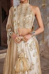 Buy_Etasha by Asha Jain_Ivory Silk, Tissue Sequins, Embroidery Halter Neck And Gold Lehenga Set 