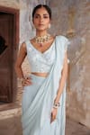Etasha by Asha Jain_Blue Georgette Ruffles, Embroidery, Sequins V-neck Ice Pre-draped Saree Set _Online_at_Aza_Fashions