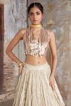 Etasha by Asha Jain_Gold Silk Embroidery, Sequins Halter Neck Textured Lehenga And Waistcoat Set _Online_at_Aza_Fashions