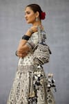 Buy_Torani_Black Tassels Kalamkari Iqra Potli Bag _at_Aza_Fashions
