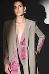 Nikita Mhaisalkar_Beige Embroidery Plunge Neck Jumpsuit With Fuschia _at_Aza_Fashions