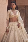 Buy_Kritika Dawar_Ivory , Organza Embroidery V-neck Chand Phool Motif Lehenga Set _Online_at_Aza_Fashions