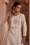 Kritika Dawar_Ivory Silk, Chanderi Embroidery, Metallic Thread Round Neck Zari Gharara Set _at_Aza_Fashions
