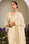 Sue Mue_Yellow Georgette Sequins, Embroidery, Beads Round Neck Light Saree Set _Online_at_Aza_Fashions