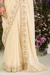 Sue Mue_Yellow Georgette Sequins, Embroidery, Beads Round Neck Light Saree Set _at_Aza_Fashions