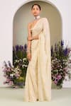 Sue Mue_Gold Chiffon Sequins, Zari Sweetheart Neck Light Yellow And Embroidered Saree Set _at_Aza_Fashions
