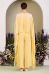 Shop_Sue Mue_Yellow Georgette Embroidery V-neck Pastel Jumpsuit _at_Aza_Fashions