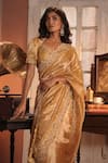 Midushi Bajoria_Gold Silk, Tissue Embroidery Sweetheart Neck Classic Saree _at_Aza_Fashions