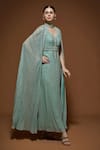 NIRRAAMYAA_Aqua Viscose, Georgette Rhinestones V-neck Blue Embellished Gown _Online_at_Aza_Fashions