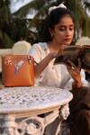 Shop_Miri_Tan Embroidery Hand Hummingbird Sling Bag _at_Aza_Fashions