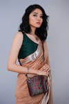 Buy_Miri_Brown Embroidery Hand Red Rosebuds Sling Bag _at_Aza_Fashions