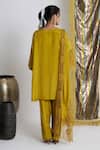 Shop_Siyona by Ankurita_Mustard Viscose, Crepe Stones, Sequins V-neck Sarson Softy Farshi Set _at_Aza_Fashions