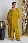 Shop_Siyona by Ankurita_Mustard Viscose, Crepe Stones, Sequins V-neck Sarson Softy Farshi Set _Online_at_Aza_Fashions