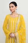 Abbaran_Yellow Chinon Sequins, Embroidery Round Neck Straight Kurta Set _at_Aza_Fashions