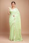Buy_Samyukta Singhania_Green Modal, Polyester, Viscose V-neck Handloom Saree With Blouse _at_Aza_Fashions