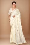 Buy_Samyukta Singhania_Cream Modal, Polyester, Viscose Round Neck Handloom Woven Saree With Blouse _at_Aza_Fashions