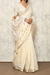 Samyukta Singhania_Cream Modal, Polyester, Viscose Round Neck Handloom Woven Saree With Blouse _Online_at_Aza_Fashions