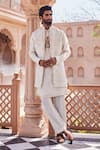 Shop_YAJY by Aditya Jain_Gold Tissue, Silk Embroidery Ivory Dream Indo-western Set _at_Aza_Fashions