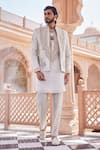 Shop_YAJY by Aditya Jain_Gold Tissue, Silk Embroidery Snowfall Serenity Indo-western Set _at_Aza_Fashions