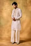 Shop_MUKTI AND KAVITH CASA_Ivory Tissue Embroidery Elegance Kurta Pant Set _Online_at_Aza_Fashions