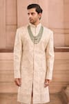 MUKTI AND KAVITH CASA_Ivory Silk Embroidery Threadwork Embellished Sherwani Set _at_Aza_Fashions