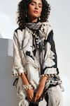 Rainas_Black Cotton, Linen Pom-poms, Tassels Round Neck Floral Print Earthen Petals Set _at_Aza_Fashions