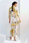 Shop_Rainas_Mustard Cotton, Linen Pom-poms Round Neck Bloom Kurta Pant Set _at_Aza_Fashions