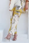 Rainas_Mustard Cotton, Linen Pom-poms Round Neck Bloom Kurta Pant Set _at_Aza_Fashions