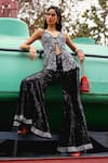 Sabe_Black Net Embroidery Scoop Neck Designer Peplum Top And Bell Bottom Pant _at_Aza_Fashions