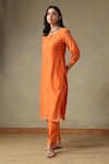 Tashee_Orange Chanderi, Cotton Embroidery Round Neck Kurta Pant Set _at_Aza_Fashions