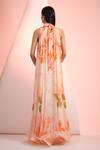 Shop_Mandira Wirk Resort_Orange Chiffon Halter Neck Floral Printed Dress _at_Aza_Fashions