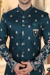 Arihant Rai Sinha_Blue Silk, Polyester, Viscose Embroidery, Sequins Blend Sherwani And White Pant _Online_at_Aza_Fashions