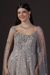 Pooja Peshoria_Silver Net, Crepe, Viscose Sequins Round Neck Hand Embroidered Cape Gown _Online