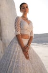 House Of Sikka_Ivory Net Sequins, Embroidery Round Neck Lehenga Set _at_Aza_Fashions