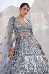 House Of Sikka_Blue Net Sequins, Embroidery, Beads Round Neck Designer Ice Lehenga Set _at_Aza_Fashions