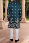 Shop_Arihant Rai Sinha_Blue Silk, Polyester, Viscose Embroidery, Sequins Blend Sherwani And White Pant _at_Aza_Fashions