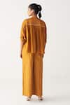 Shop_Three_Mustard Chanderi, Crepe Beads Round Neck Pintuck Bat Sleeve Shirt _at_Aza_Fashions