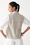 Shop_Three_Beige Handloom Cotton Embroidery High Neck Sleeveless Pocket Bomber _at_Aza_Fashions
