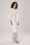 Buy_Atbw_White Modal, Satin Embroidery, Pearls Off-shoulder Asymmetric Top _Online_at_Aza_Fashions