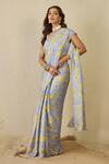 Label Nitika_Blue Satin, Georgette Scoop Neck Moon Saree With Stitched Blouse _at_Aza_Fashions