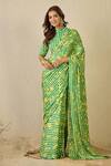 Buy_Label Nitika_Green Satin, Georgette, Cotton Emerald Striped Saree With Stitched Blouse _at_Aza_Fashions