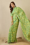 Label Nitika_Green Satin, Georgette, Cotton Emerald Striped Saree With Stitched Blouse _at_Aza_Fashions