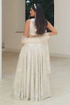Shop_Pooja Bagaria_Silver Silk Sequins, Embroidery Round Neck Mesh Lehenga Set _at_Aza_Fashions