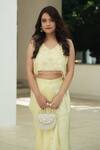 Pooja Bagaria_Yellow Organza, Satin Fringe, Embroidery Pastel Monotone Draped Skirt Set _Online_at_Aza_Fashions