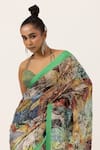 Unallume By Nisha_Green Silk Floral Drift Saree _Online_at_Aza_Fashions