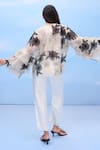 Shop_COUCHÉ BY ANANDINI_Beige Silk Organza Embroidery Round Neck Designer Floral Top In _at_Aza_Fashions