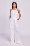 Buy_Dev And Viv_White Linen Halter Neck Jumpsuit _at_Aza_Fashions