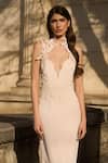 Supria Munjal_Cream Crepe Embroidery Halter Neck Designer And Pink Gown _Online_at_Aza_Fashions